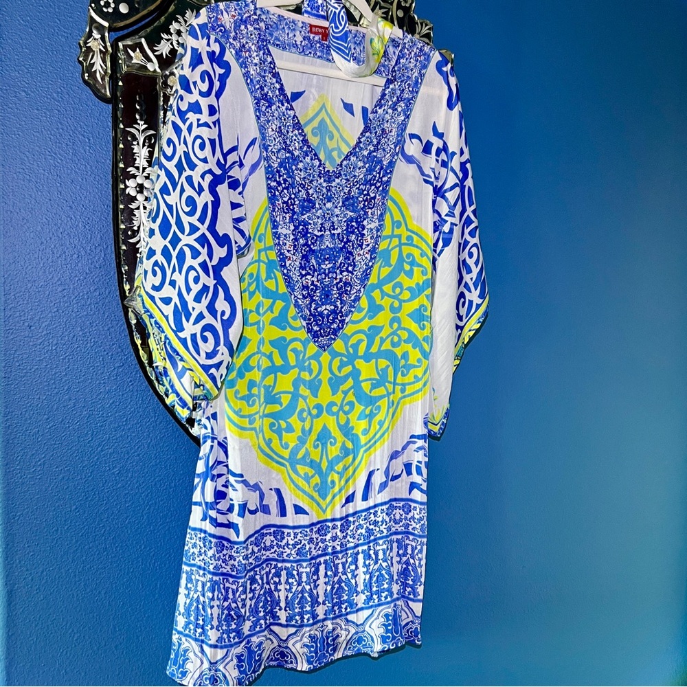 100% Silk dress with beading and a sash. Beautiful dress - formal or casual.